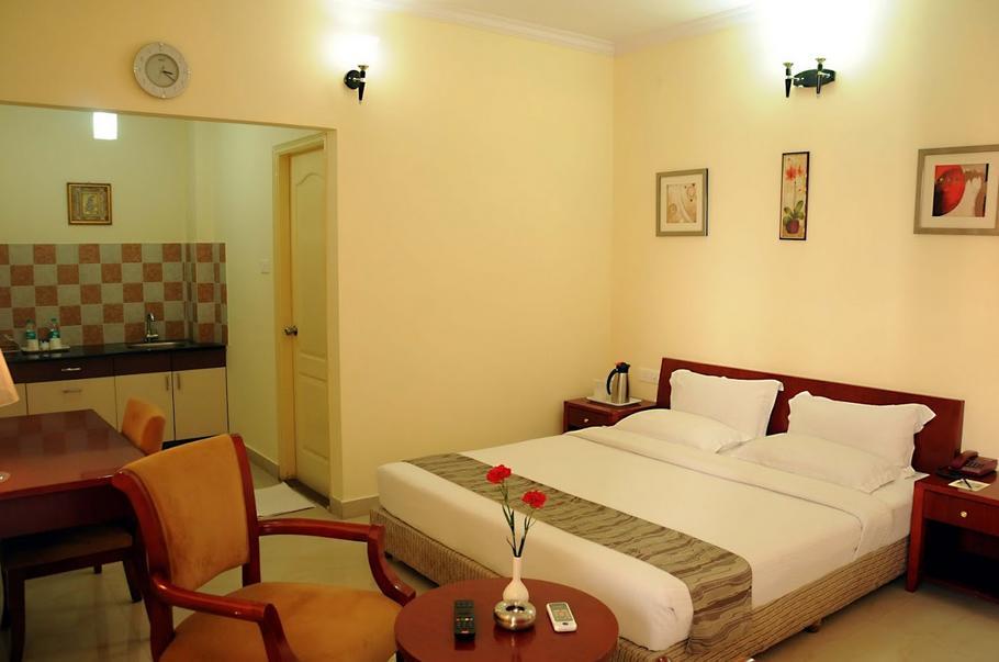 Ivory Inn Bangalore Habitación foto