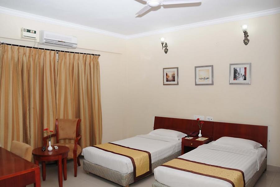 Ivory Inn Bangalore Habitación foto