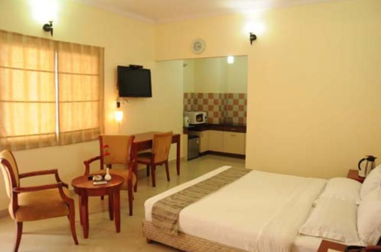 Ivory Inn Bangalore Habitación foto